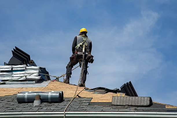 Professional Roof Replacement technician working in North Bend, OR